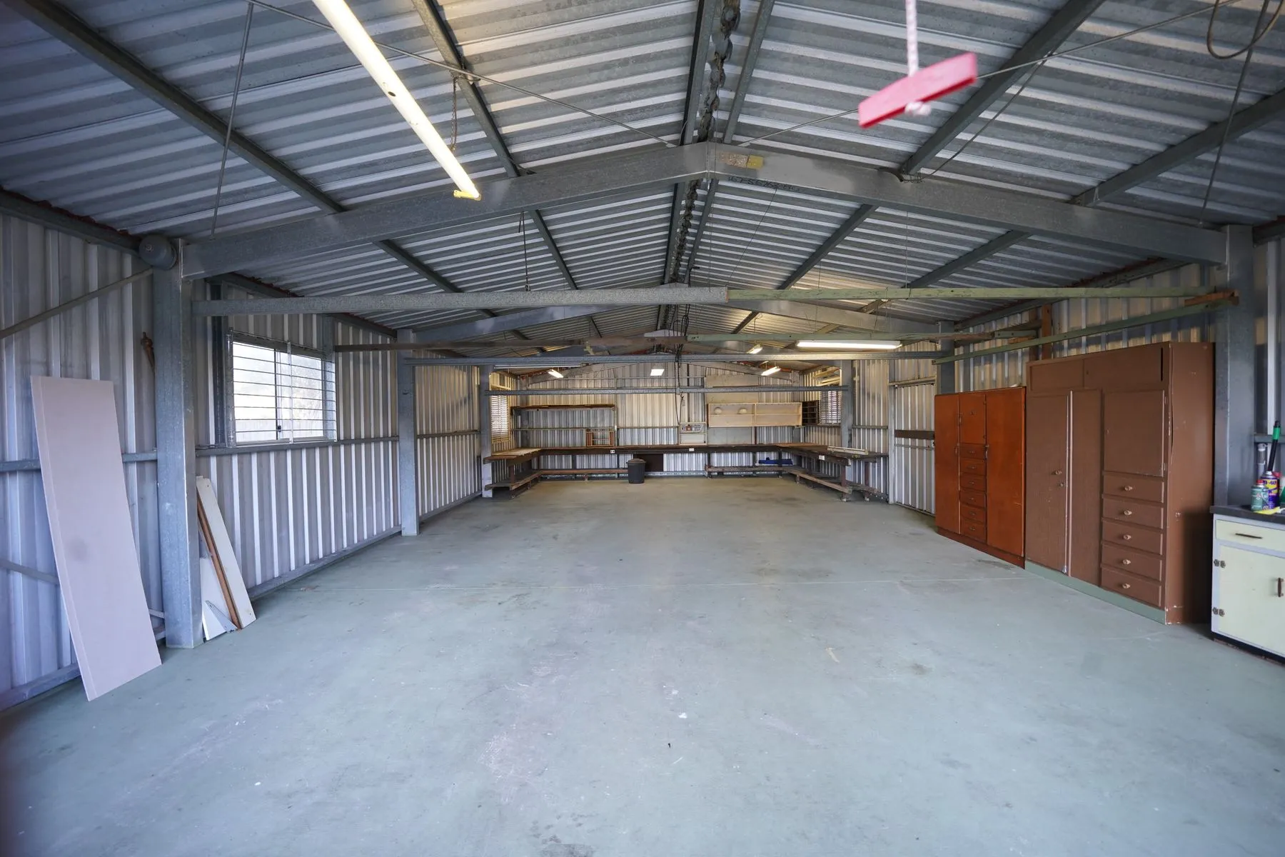 Empty service bay with level concrete floor used for static calibration